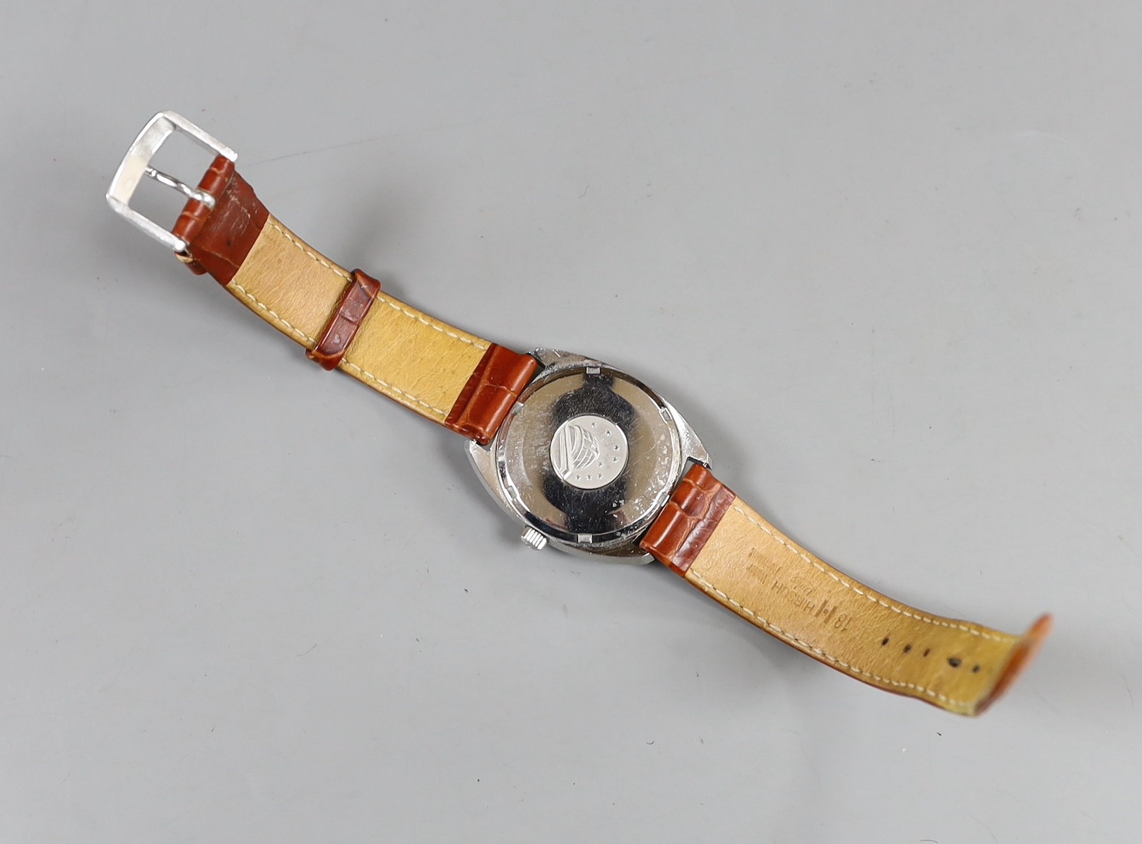 A gentleman's stainless steel Omega Constellation automatic wrist watch, with original box, on associated leather strap.